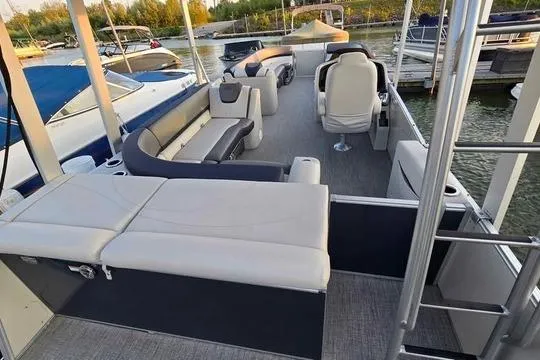 Slide: The Image of 2023 Avalon Catalina Funship 2585 pontoon boat with spacious seating and modern design. - 7