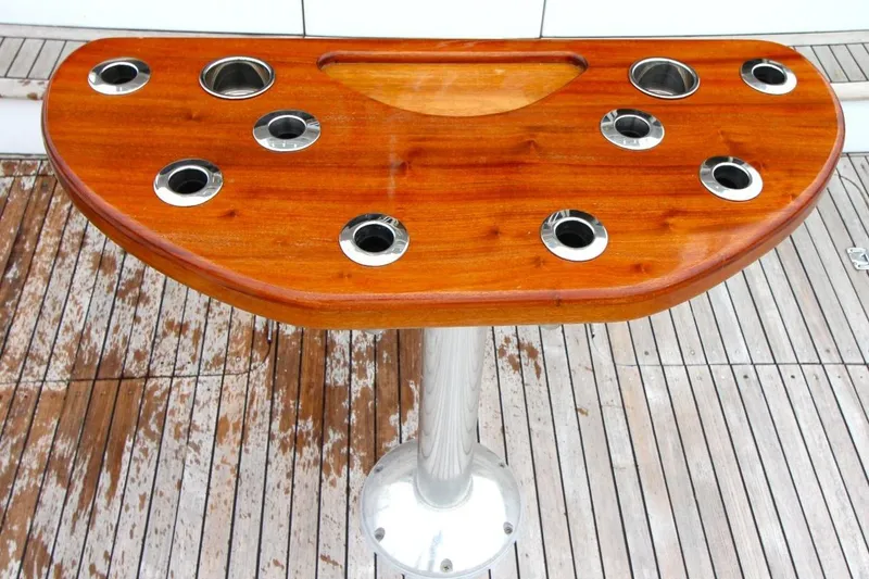Slide: The Image of Wooden fishing rod holder on 1999 Ocean Yachts 60 Super Sport deck. - 18