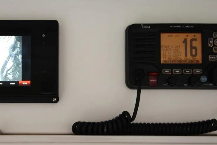 Slide: The Image of Control panel and radio equipment on a 1999 Ocean Yachts 60 Super Sport. - 33