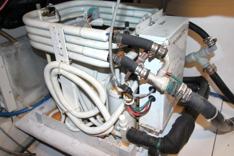 Slide: The Image of Engine room equipment of a 1999 Ocean Yachts 60 Super Sport boat. - 68