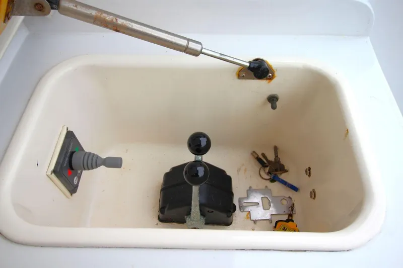 Slide: The Image of Control panel of 1999 Ocean Yachts 60 Super Sport with keys and joystick. - 19