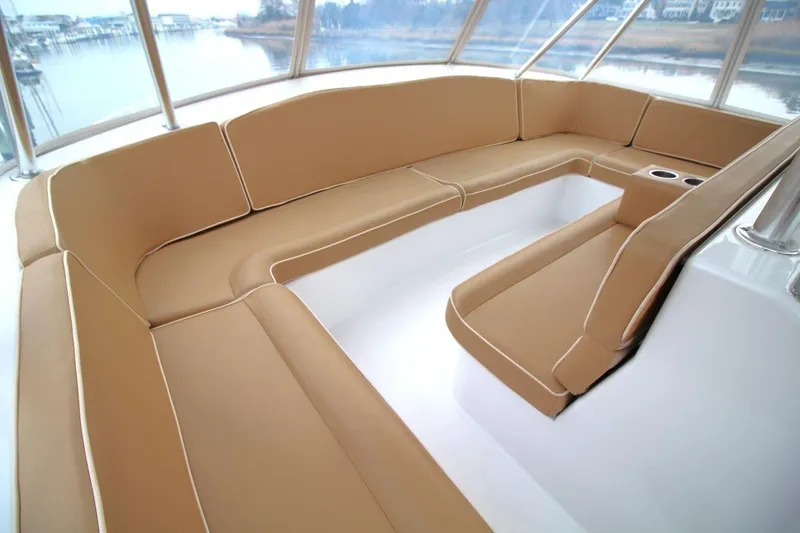 Slide: The Image of Luxurious seating area on a 1999 Ocean Yachts 60 Super Sport boat. - 24