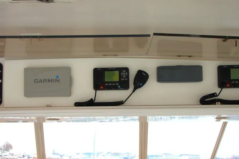 Slide: The Image of Control panel of a 1999 Ocean Yachts 60 Super Sport with Garmin equipment. - 28