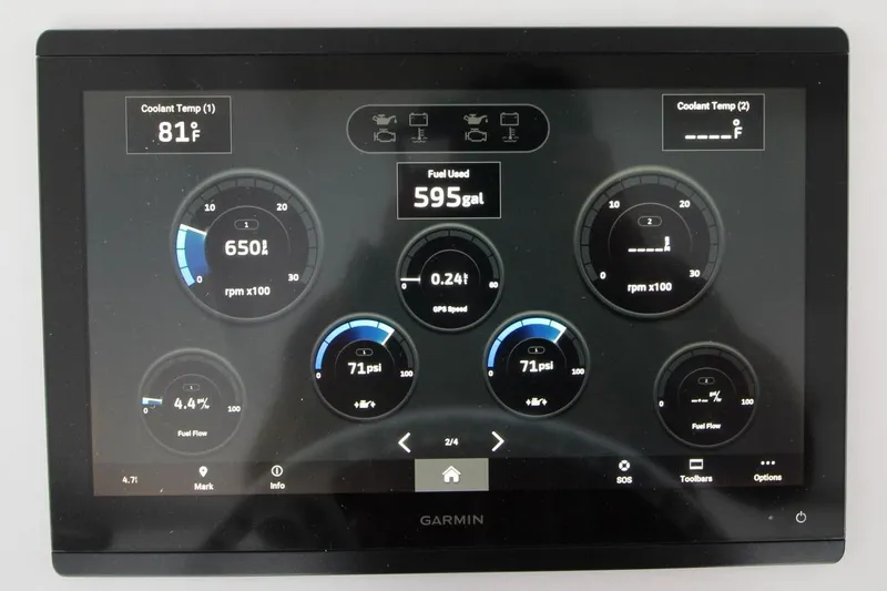 Slide: The Image of Garmin display showing engine metrics for 1999 Ocean Yachts 60 Super Sport. - 31