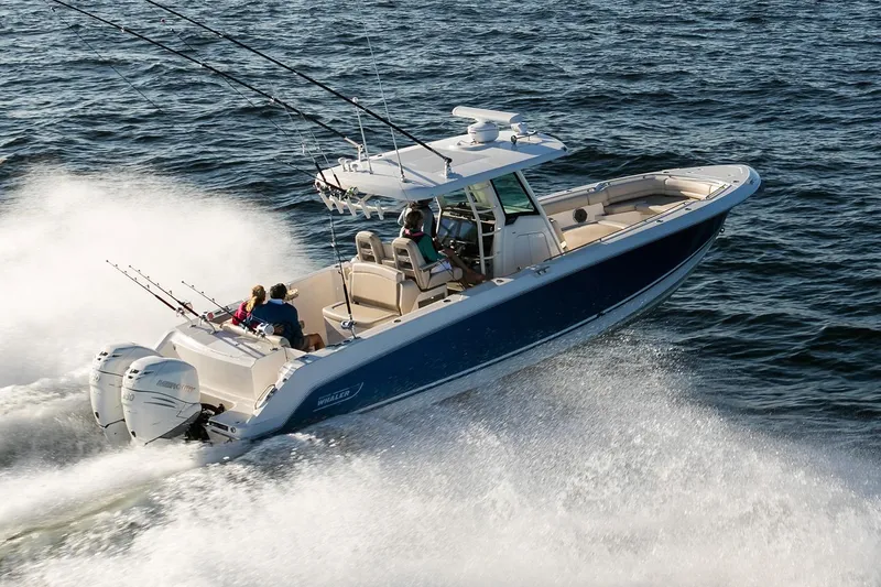 Slide: The Image of Manufacturer Provided Image: 2017 Boston Whaler 330 Outrage cruising on open water. - 3