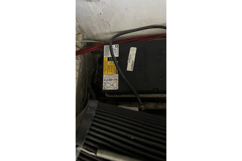 Slide: The Image of Battery compartment of a 1968 Bertram 31 Bahia Mar boat. - 14