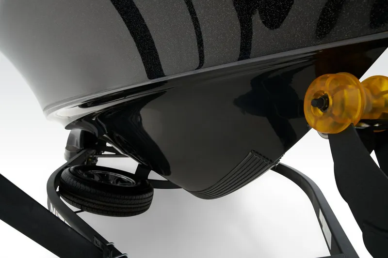 Slide: The Image of 2024 Nitro ZV20 Pro boat interior with storage compartments and cup holder. - 6