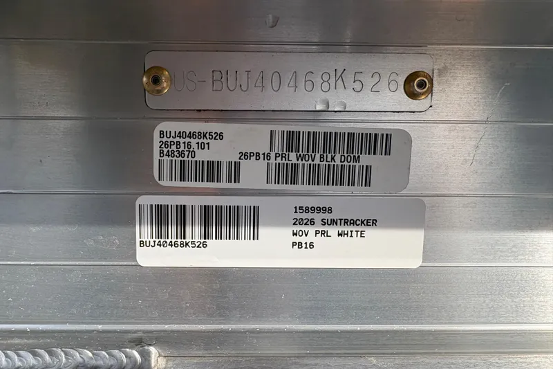 Slide: The Image of 2026 Sun Tracker Party Barge 16 DLX identification plate with serial numbers and barcodes. - 87