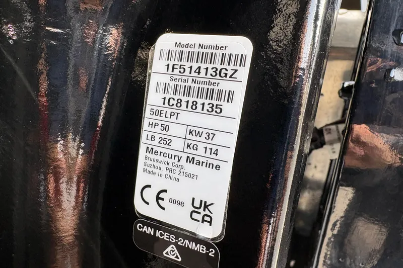Slide: The Image of Label on a 2026 Sun Tracker Party Barge 16 DLX, showing model and serial numbers. - 88