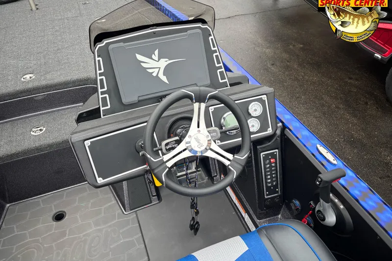 Slide: The Image of 2026 Ranger Z521 boat dashboard with steering wheel and control panel. - 7