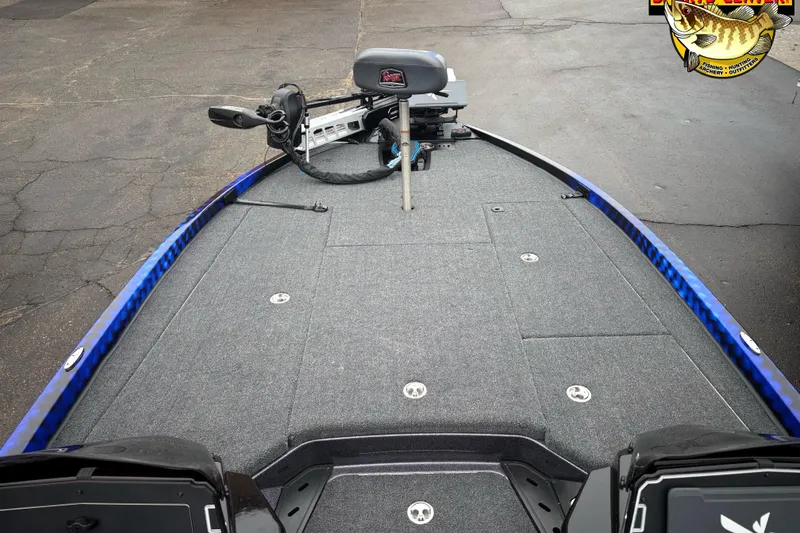 Slide: The Image of 2026 Ranger Z521 boat deck with trolling motor and fishing seat. - 9