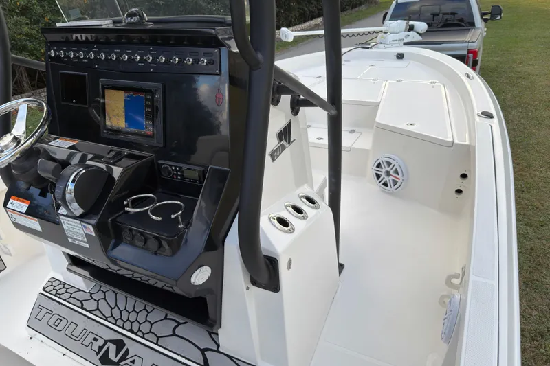 Slide: The Image of 2019 Wellcraft 241 Bay boat interior with steering console and navigation system. - 20