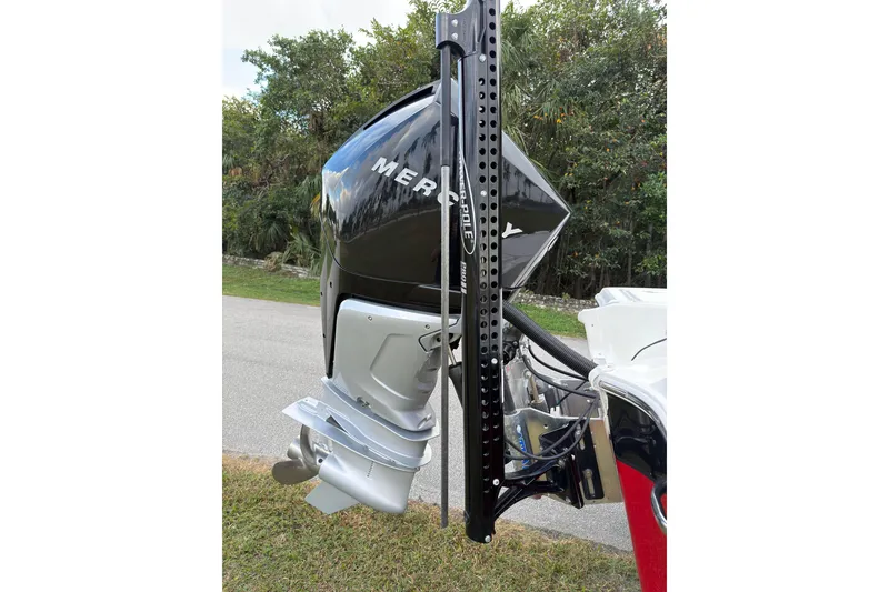Slide: The Image of 2019 Wellcraft 241 Bay boat with Mercury outboard motor and Power-Pole anchor system. - 31