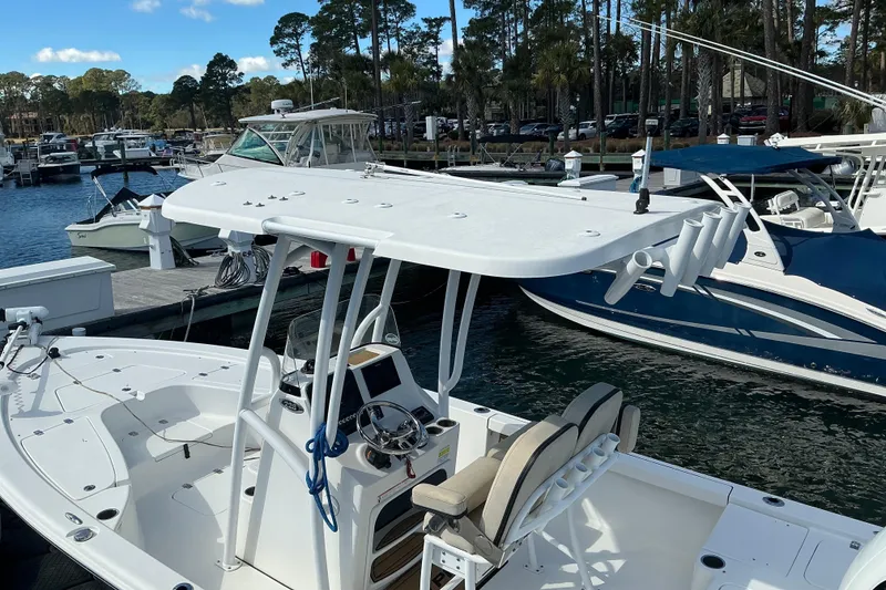 Slide: The Image of 2022 Seapro 228 Bay boat docked at marina with clear sky. - 28