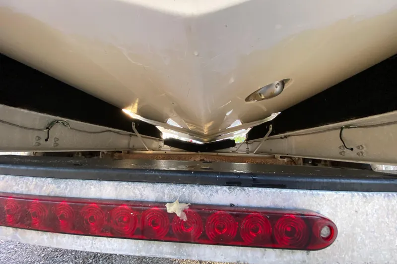 Slide: The Image of 2020 Pathfinder 2500 Hybrid boat hull on trailer with red tail light. - 10
