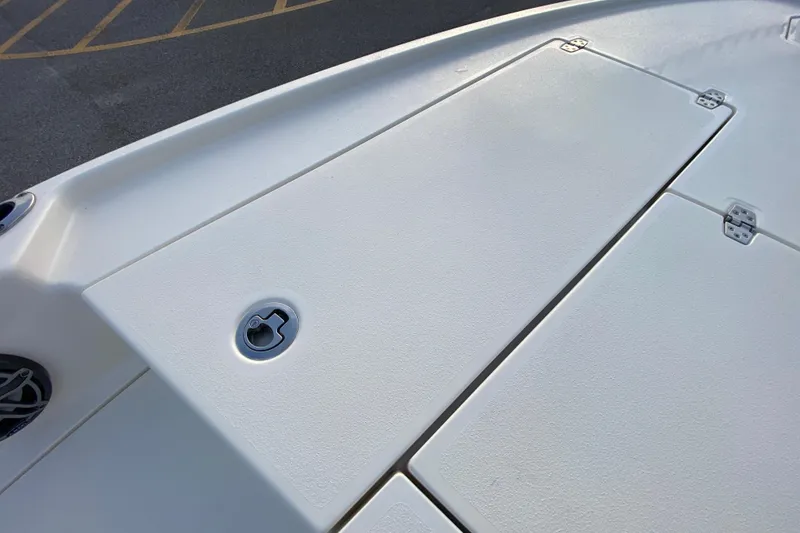 Slide: The Image of 2020 Pathfinder 2500 Hybrid boat deck with storage compartments and latch. - 22