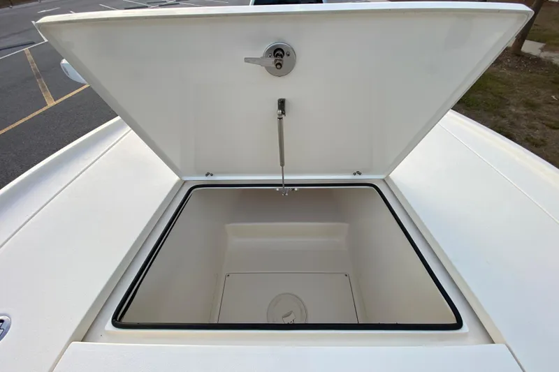 Slide: The Image of Open storage compartment on 2020 Pathfinder 2500 Hybrid boat deck. - 26