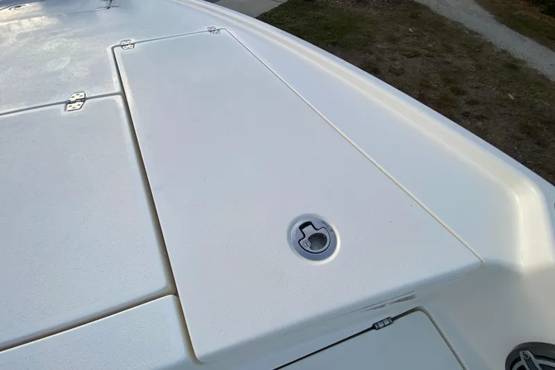 Slide: The Image of 2020 Pathfinder 2500 Hybrid boat deck with storage hatch and latch. - 28