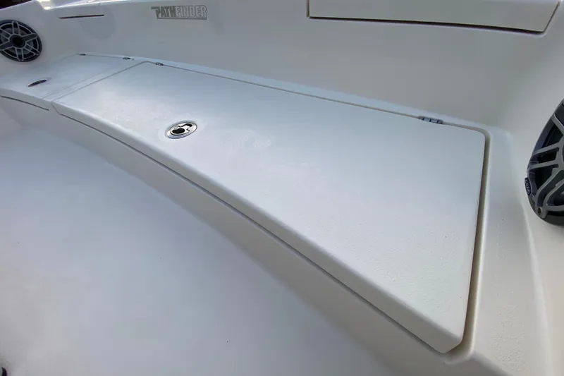 Slide: The Image of 2020 Pathfinder 2500 Hybrid boat interior with storage compartment and speakers. - 31