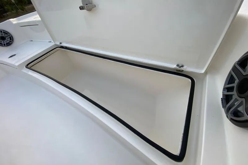 Slide: The Image of Open storage compartment on 2020 Pathfinder 2500 Hybrid boat deck. - 32