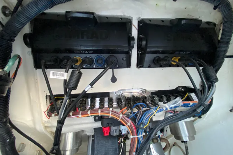 Slide: The Image of Electrical wiring and components inside a 2020 Pathfinder 2500 Hybrid boat. - 41