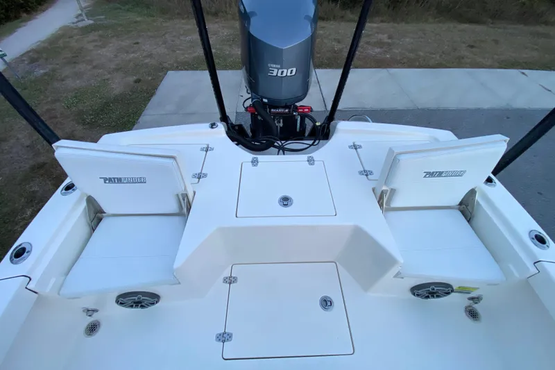 Slide: The Image of 2020 Pathfinder 2500 Hybrid boat with Yamaha 300 engine, featuring rear seating and storage compartments. - 62