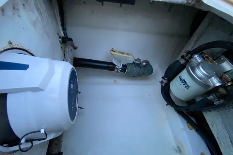 Slide: The Image of Boat engine compartment of 2020 Pathfinder 2500 Hybrid with visible components and fittings. - 65