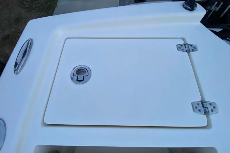 Slide: The Image of 2020 Pathfinder 2500 Hybrid boat hatch with stainless steel hinges and handle. - 66