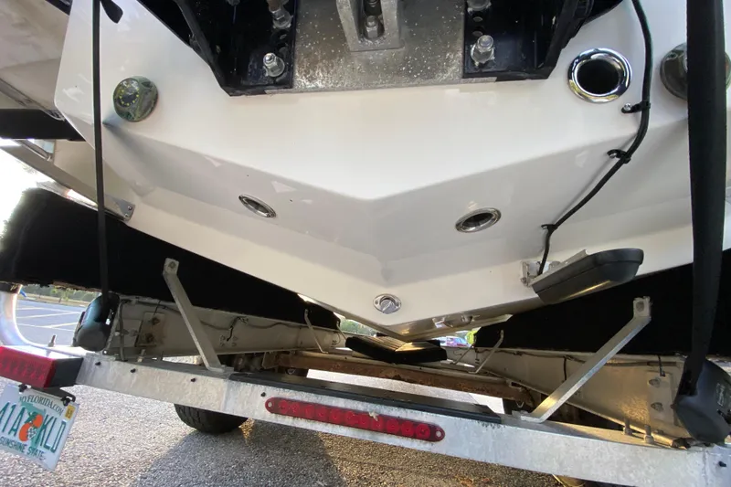 Slide: The Image of 2020 Pathfinder 2500 Hybrid boat on trailer, rear view showing hull and fittings. - 9