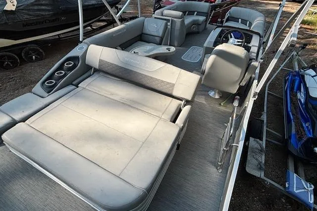 Slide: The Image of 2023 Bennington 23 SXSB pontoon boat with spacious seating and modern design. - 13