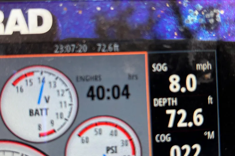 Slide: The Image of Dashboard of 2023 Bennington 23 SXSB showing speed, depth, and battery voltage. - 20