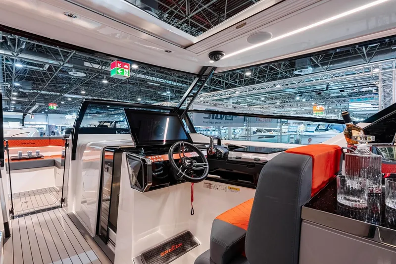 Slide: The Image of Luxurious 2026 Dracan 42 Catamaran interior with modern helm and elegant seating. - 18