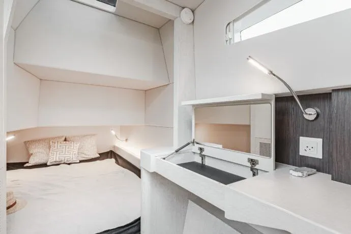 Slide: The Image of Modern interior of 2026 Dracan 42 Catamaran, featuring a cozy cabin with sleek design. - 29