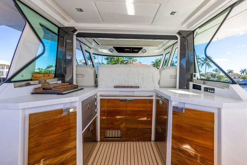Slide: The Image of 2024 Tiara Yachts 48 LS interior with sleek wood cabinetry and modern design. - 18