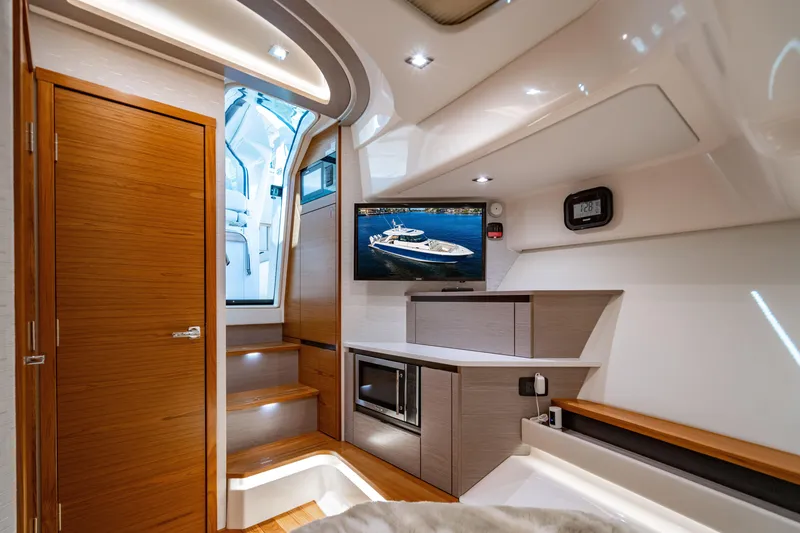 Slide: The Image of Luxurious interior of 2024 Tiara Yachts 48 LS with modern amenities and sleek design. - 41