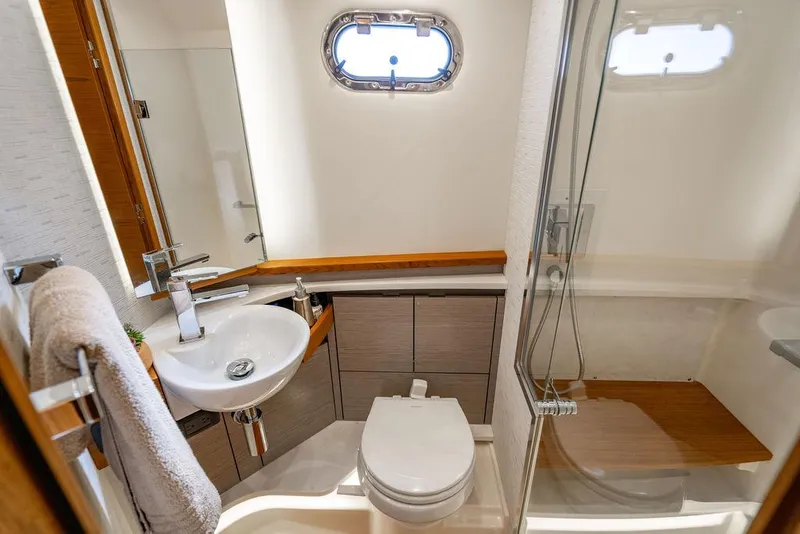 Slide: The Image of Luxurious bathroom in 2024 Tiara Yachts 48 LS, featuring modern fixtures and elegant design. - 42