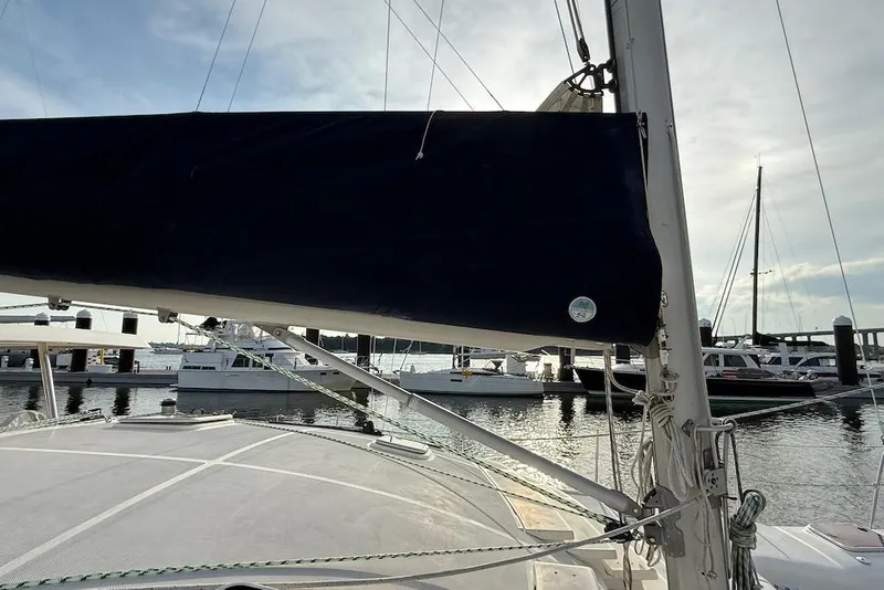 Slide: The Image of Sailboat Island Spirit 401, 2006 model, docked at marina with other boats. - 20