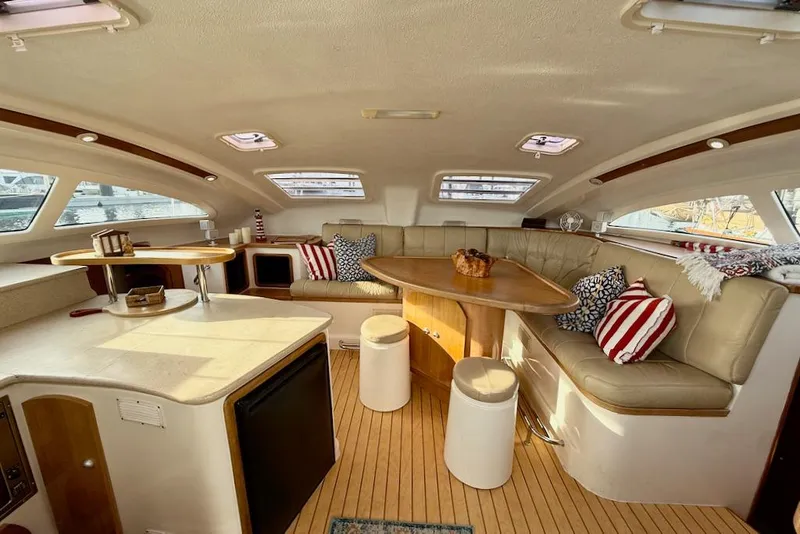 Slide: The Image of Luxurious interior of 2006 Island Spirit 401 yacht with plush seating and elegant decor. - 21
