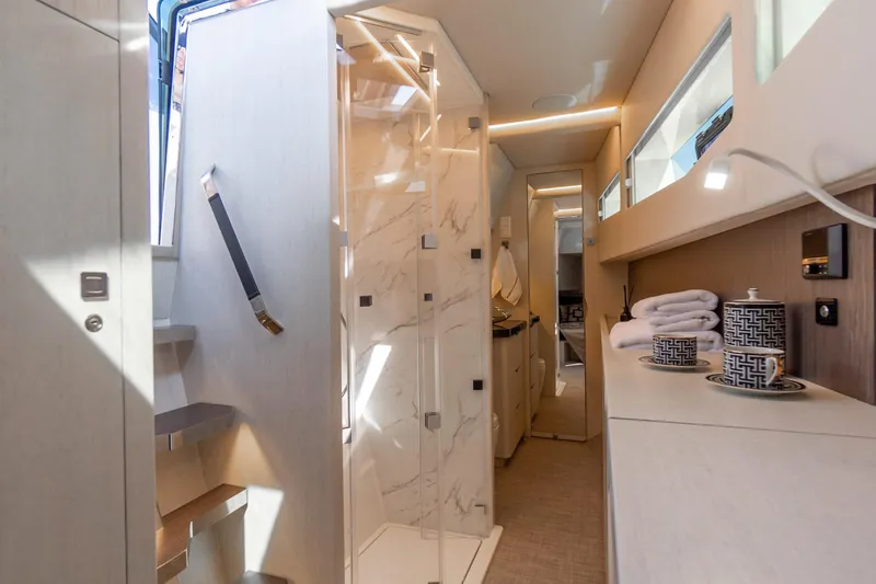 Slide: The Image of Luxurious interior of 2026 Dracan 42 Catamaran featuring modern design and elegant amenities. - 25