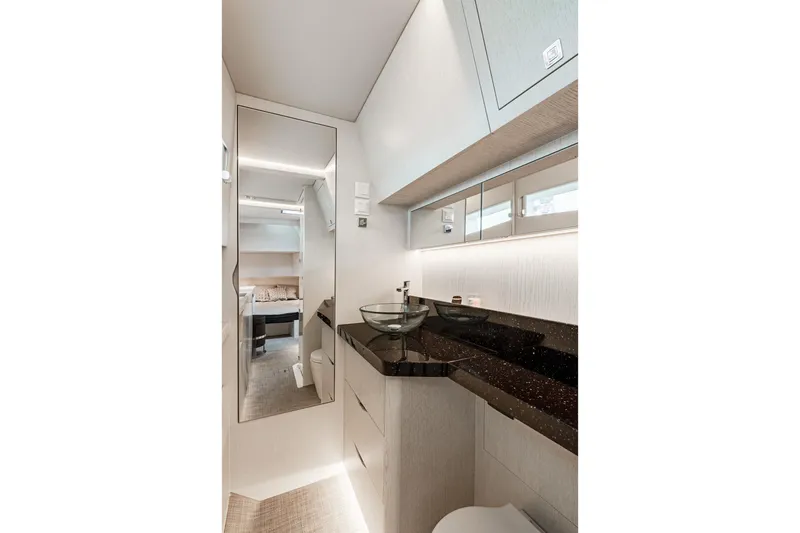 Slide: The Image of Luxurious bathroom interior of 2026 Dracan 42 Catamaran with modern fixtures and sleek design. - 26