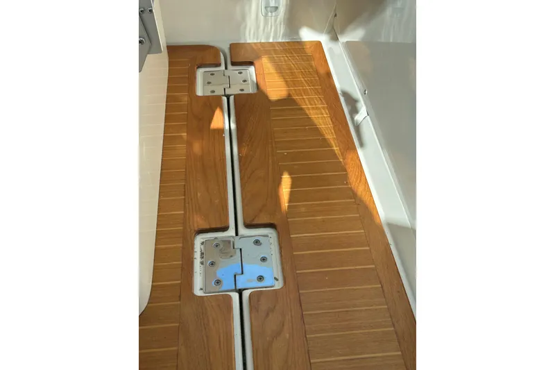 Slide: The Image of 2008 Back Cove 33 boat dashboard with Icom VHF marine radio and Furuno navigation displays. - 29