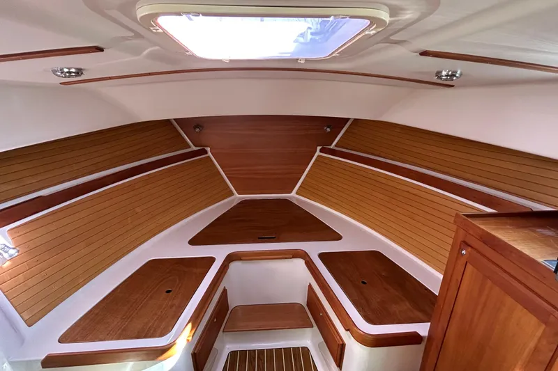Slide: The Image of Interior view of 2008 Back Cove 33 boat with wooden cabinetry and paneling. - 44