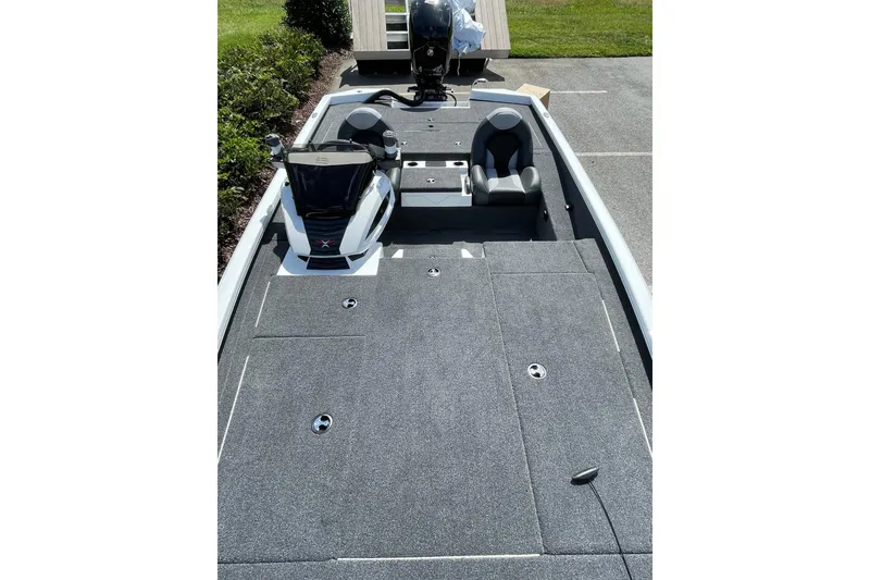 Slide: The Image of 2025 Vexus AVX1980 boat interior with seating and storage compartments. - 4