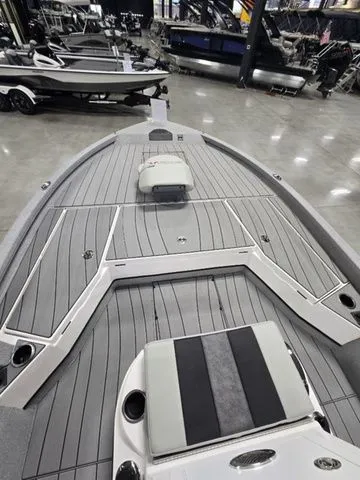 Slide: The Image of 2025 Vexus ACX2210 boat interior with sleek seating and modern design. - 6