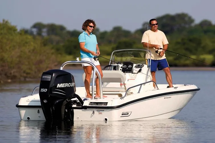 Slide: The Image of Manufacturer Provided Image: 2021 Boston Whaler 180 Dauntless boat with two people fishing on calm water. - 7