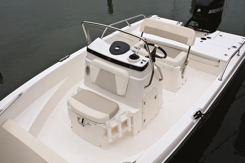 Slide: The Image of Manufacturer Provided Image: 2021 Boston Whaler 180 Dauntless boat interior with seating and console. - 9