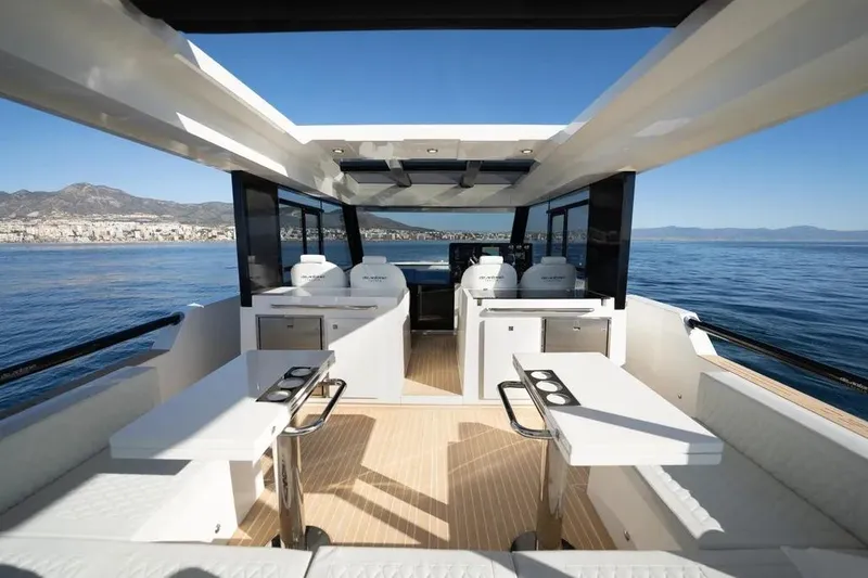 Slide: The Image of Luxurious 2026 De Antonio Yachts D50 interior with sleek design and ocean view. - 8