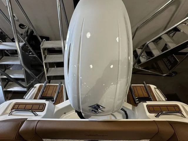 Slide: The Image of 2025 Pioneer ISLANDER 202 boat with sleek design and modern outboard motor. - 14