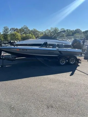 The Image of 2025 Ikon Boats VLX21 on trailer in sunny outdoor setting. - 1