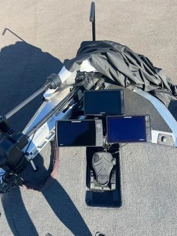 Slide: The Image of 2025 Ikon Boats VLX21 dashboard with multiple screens and controls. - 5